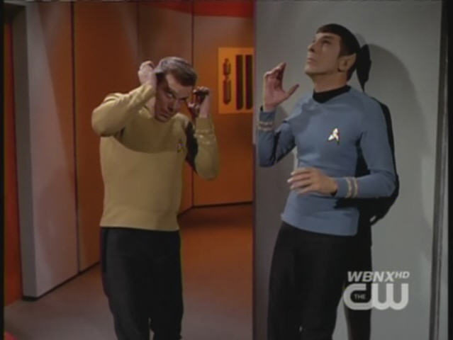 member of the enterprise writhing in pain with bob dylan on the intercom